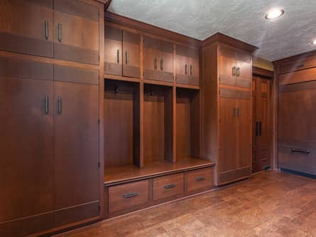 Custom cabinets and cork floor in laundry room