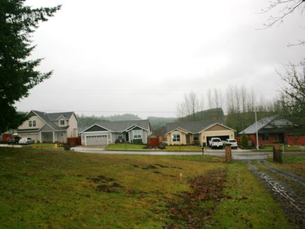 More new houses built across the street than aerial photographs show