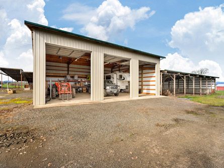 Farm equipment or RV storage building with roll-up doors