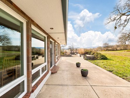 Expansive concrete deck perfect for entertaining