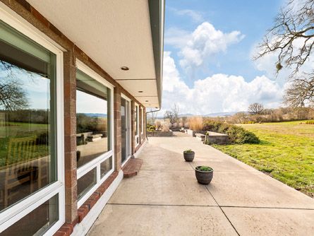 Expansive concrete deck perfect for entertaining